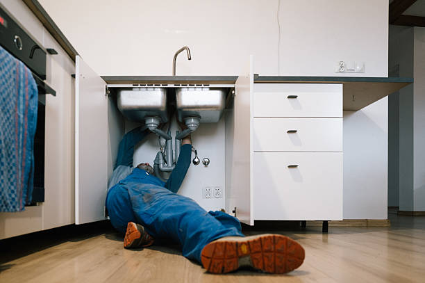 Professional Drain Cleaning technician working in Orange Beach, AL